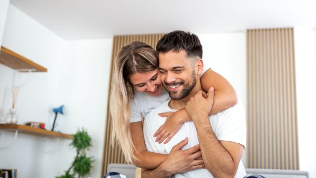 Happy young couple hugging