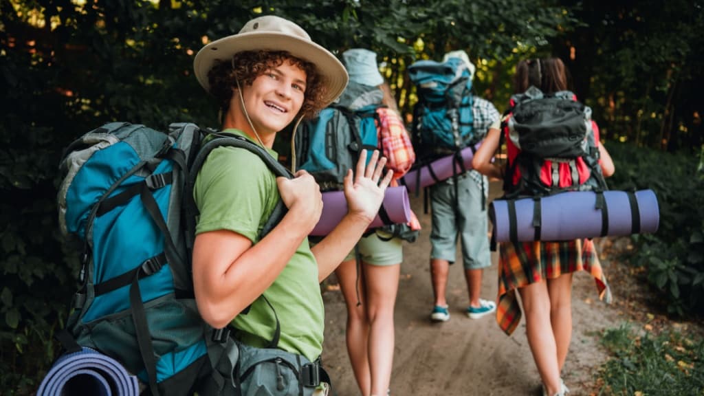 Teenagers hiking in a group.