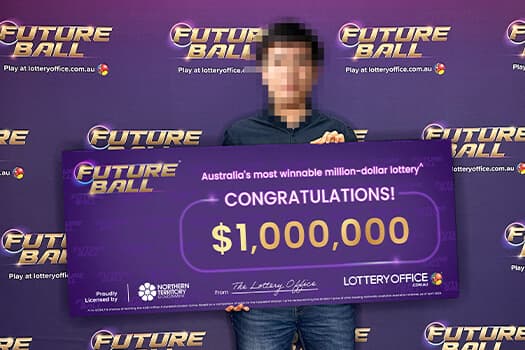 Winner holding cheque